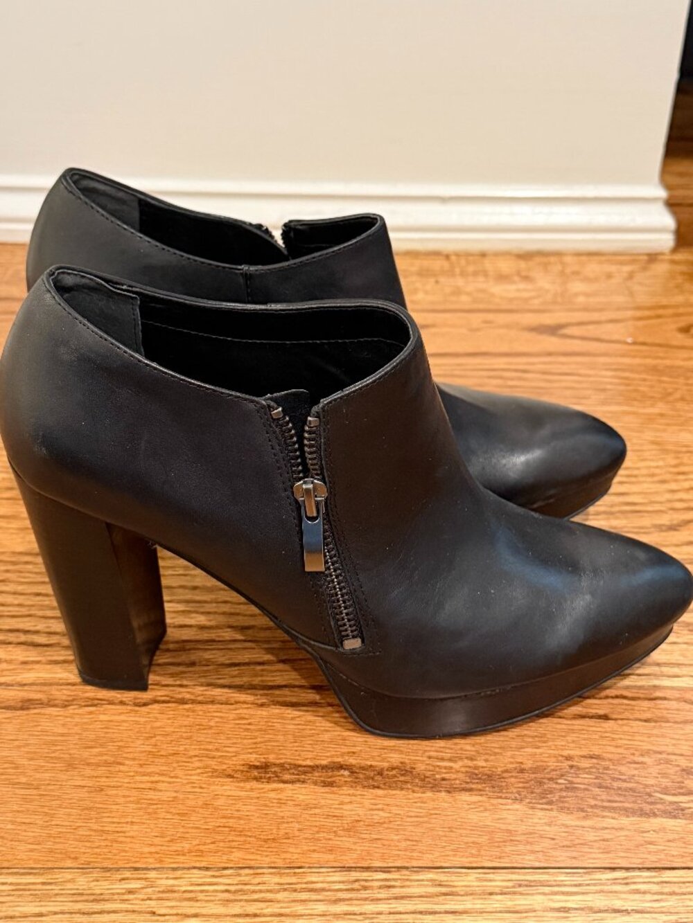 Worn 1 time.  Black Leather Franco Sarto Heeled Booties